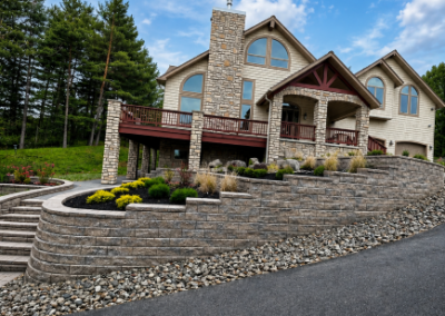 Large block retaining wall on slope